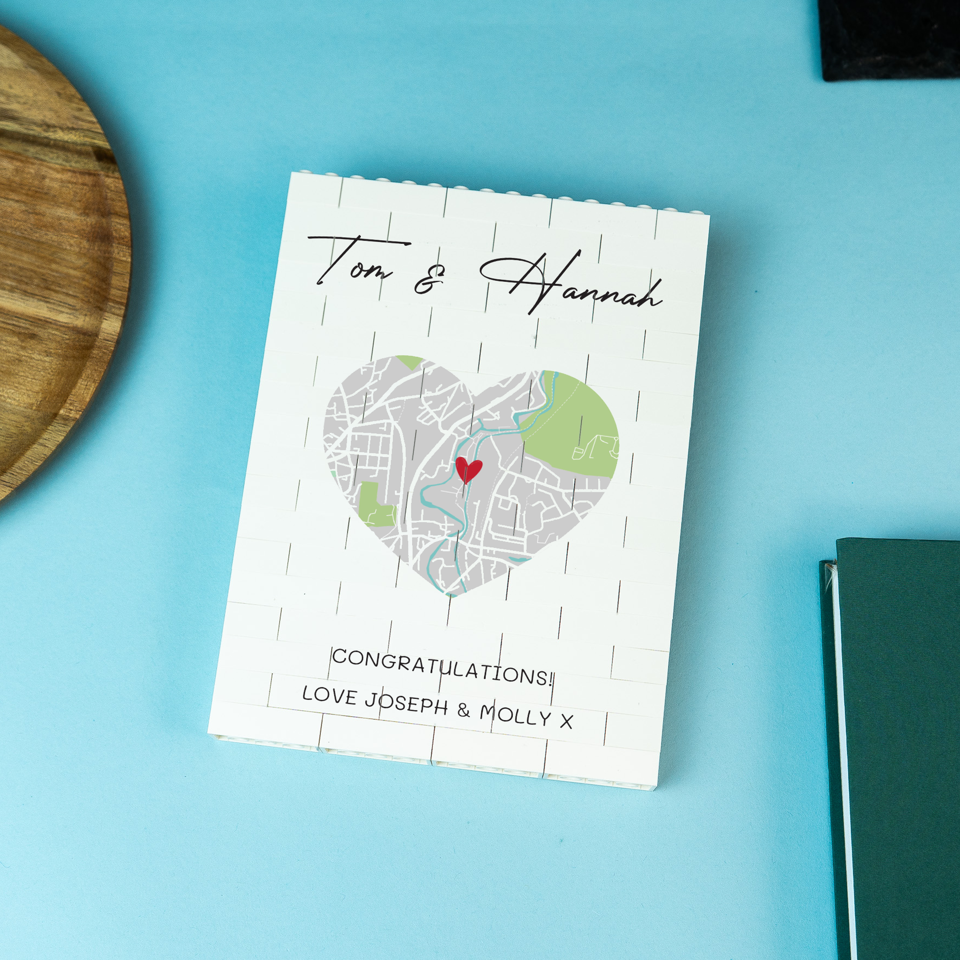 LEGO Brick block with heart-shaped map design on a blue background