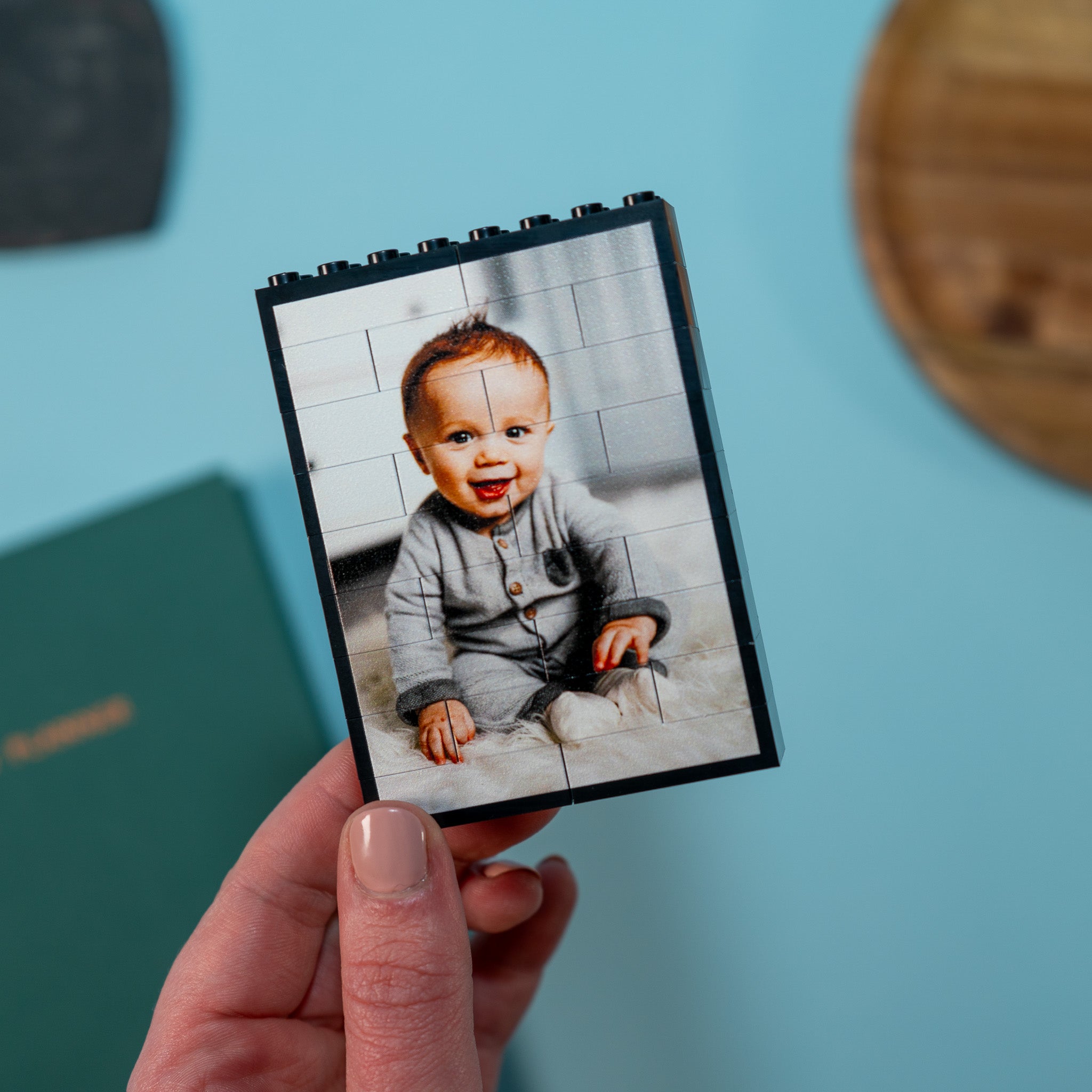 Personalised portrait LEGO® brick photo block of baby on desk – modern keepsake for family, couples, or friends