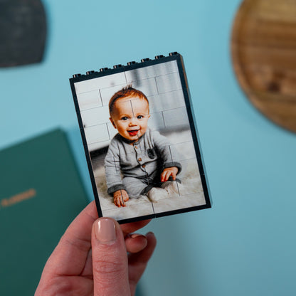 Personalised portrait LEGO® brick photo block of baby on desk – modern keepsake for family, couples, or friends