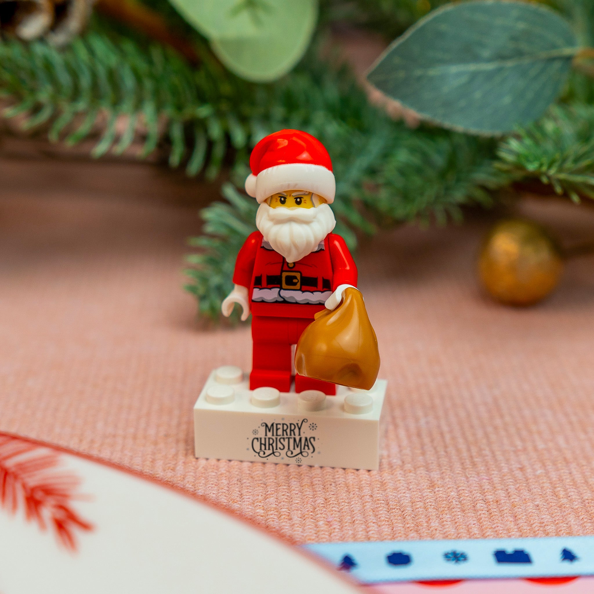Merry Christmas LEGO® brick with Santa minifigure festive display gift